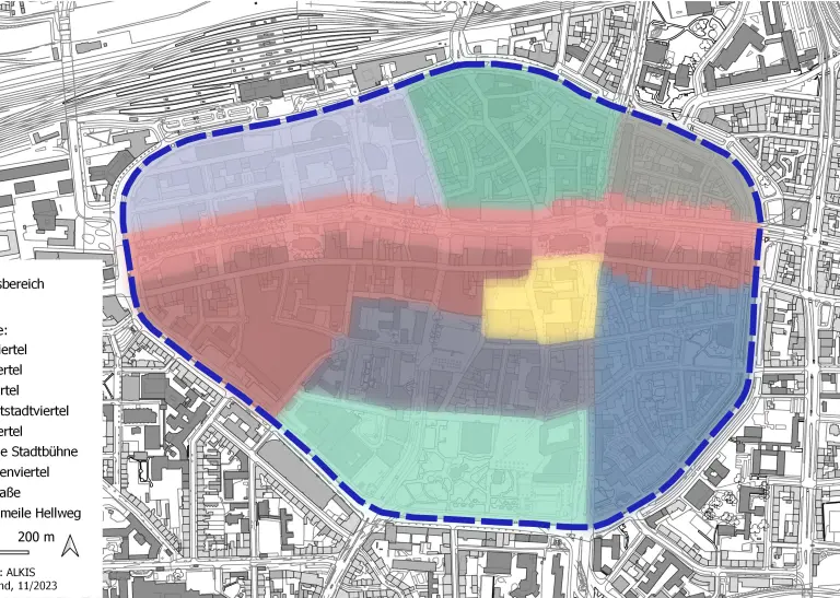 Schwarz-weiß-Stadtplan der Dortmunder City mit bunt eingezeichneten Quartieren. 